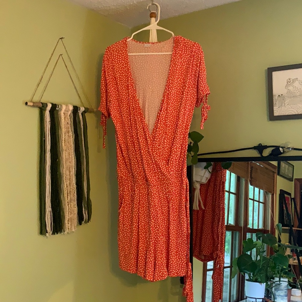 Orangy red romper. Size L